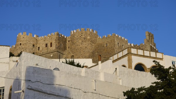 Majestic, historic castle above white buildings under a blue sky, Monastery of St John the Theologian, Monastery of St John the Theologian, World Heritage Site 1999, Chora, Patmos, Dodecanese, Greek Islands, Greece