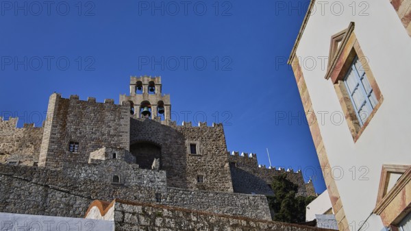 Stony old castle with walls and towers under a blue sky, Monastery of St John the Theologian, Monastery of St John the Theologian, World Heritage Site 1999, Monastery entrance north side, Chapel of the Apostles, Chora, Patmos, Dodecanese, Greek Islands, Greece
