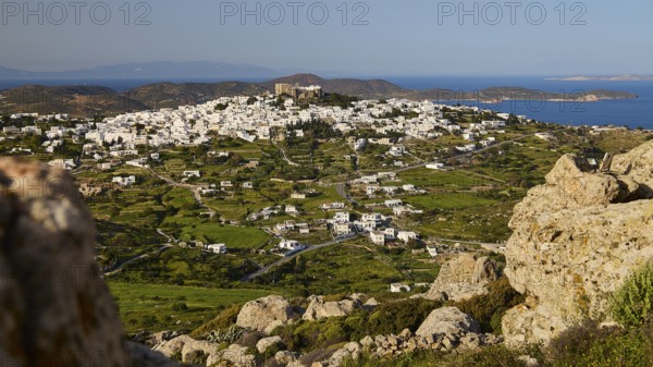 Rocky landscape with panoramic view of a village and the sea, Monastery of St John the Theologian, Monastery of St John the Theologian, World Heritage Site 1999, Chora, Patmos, Dodecanese, Greek Islands, Greece