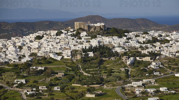 Panoramic view of a town with white houses in a green landscape, Monastery of St John the Theologian, Monastery of St John the Theologian, World Heritage Site 1999, Chora, Patmos, Dodecanese, Greek Islands, Greece