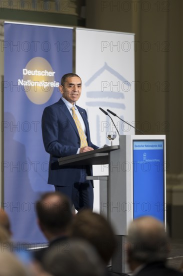 Ugur Sahin (founder of Biontech SE) gives an acceptance speech after receiving the German National Prize 2025 at the Französische Friedrichstadtkirche, Berlin, on 10 June 2025