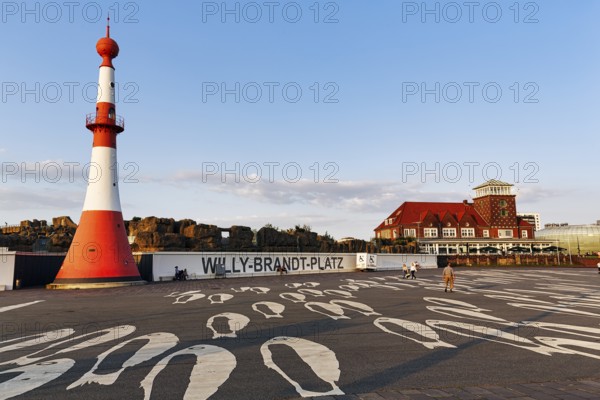 Willy-Brandt-Platz, Willy Brandt Platz with lighthouse front light and restaurant Strandhalle, Havenwelten, Bremerhaven, Bremen, Germany