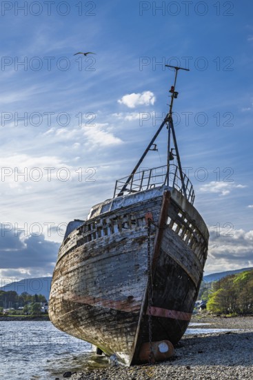 Corpach Wreck or Old Boat of Caol and Nevis Range Mountains, Caol Beach, Corpach, Fort William, Highland, Scotland, UK