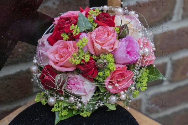 Bridal bouquet of red and pink roses, North Rhine-Westphalia, Germany