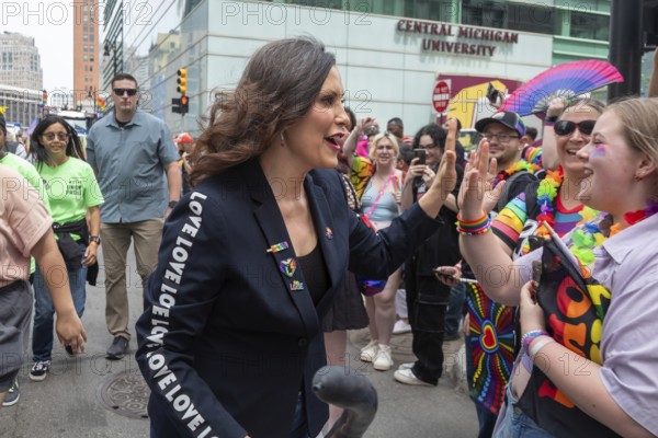 Detroit, Michigan USA - 8 June 2025 - Gay, lesbian, bisexual, and transgender activists and their allies marched for equality in the Motor City Pride parade. Michigan Governor Gretchen Whitmer greeted parade spectators