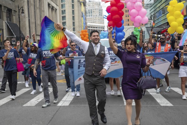 Detroit, Michigan USA - 8 June 2025 - Gay, lesbian, bisexual, and transgender activists and their allies marched for equality in the Motor City Pride parade. Delta Airlines employees joined the parade