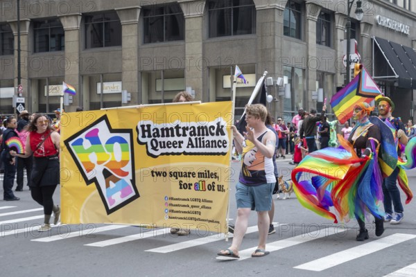 Detroit, Michigan USA - 8 June 2025 - Gay, lesbian, bisexual, and transgender activists and their allies marched for equality in the Motor City Pride parade. Residents of Hamtramck, a city that has banned display of gay pride flags on city flagpoles, joined the march