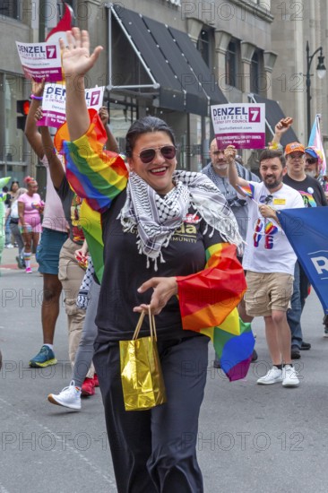 Detroit, Michigan USA - 8 June 2025 - Gay, lesbian, bisexual, and transgender activists and their allies marched for equality in the Motor City Pride parade. Congresswoman Rashida Tlaib joined the parade