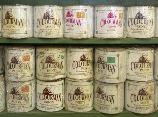 Tins of Colourman Paints displayed shelf, UK