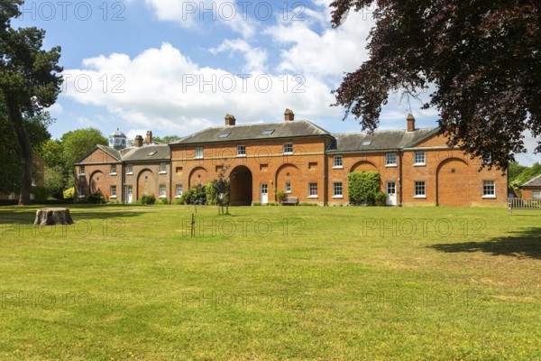 Stable block buildings converted to residential use, Sudbourne Hall, Suffolk, England, UK