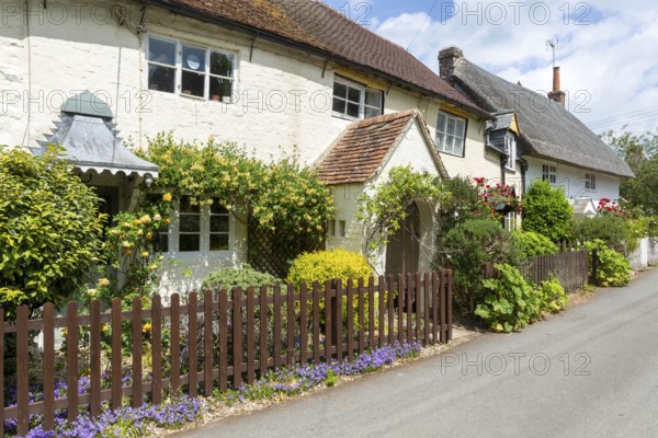 Attractive historic cottages in village of Avebury, Wiltshire, England, UK
