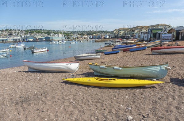 Small boats in harbour at Back Beach, Teignmouth, south Devon, England, UK