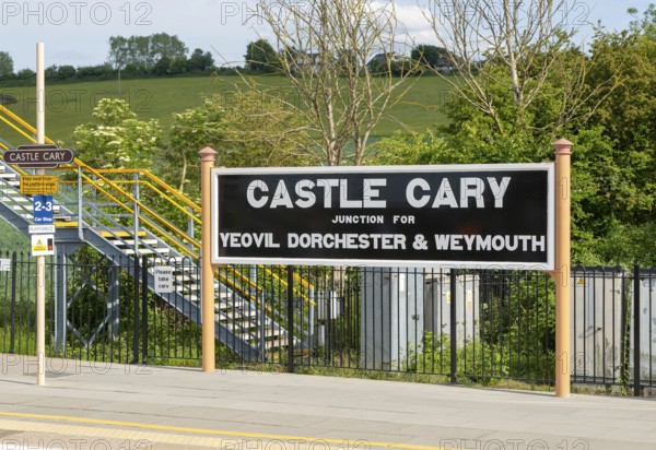 Railway station platform sign Castle Cary junction for Yeovil Dorchester and Weymouth, Somerset, England, UK