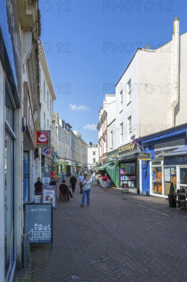 Pedestrianised shopping street in town centre, Bank Street, Teignmouth, south Devon, England, UK