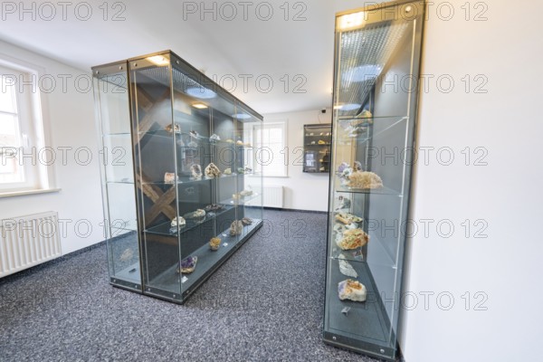 Museum showcases with a variety of minerals and rock exhibits, mineral museum, family festival in Neubulach, district of Calw, Germany