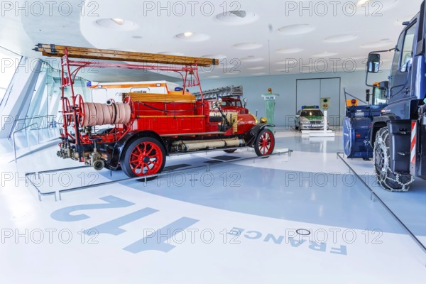 Gallery of helpers with rescue and police vehicles. The Mercedes-Benz Museum in Stuttgart presents a journey through the automotive history of the global corporation. The history of the Mercedes star begins with the first automobile in 1886. 160 vehicles are on display. Stuttgart, Baden-Württemberg, Germany