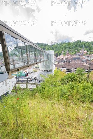 View of an urban landscape with modern bridge and surrounding nature, Zob extension with bridge construction for the new Herman Hesse railway, Calw, Black Forest, Germany