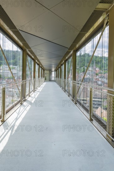 Interior view of a modern bridge with glass walls and panoramic views of the surrounding area, Zob extension with bridge construction for the new Herman Hesse railway, Calw, Black Forest, Germany
