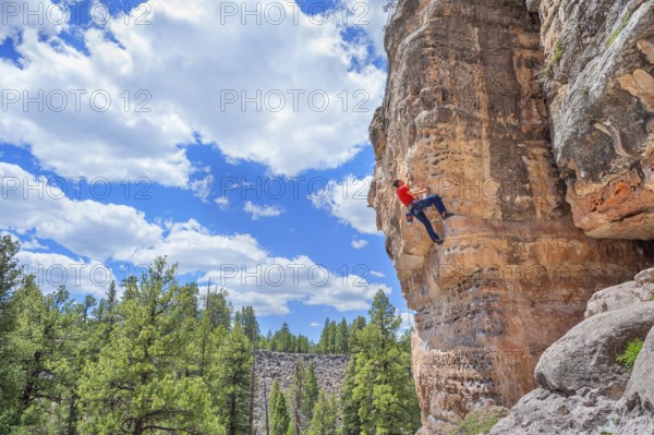 Man rock climbing at The Pit in Sandy's Canyon, Flagstaff, Arizona, USA