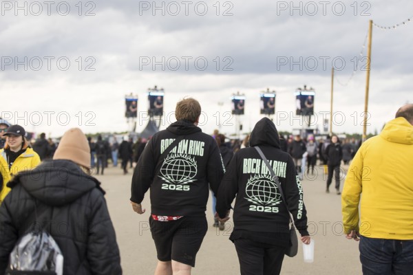 Festival visitor with Rock am Ring 2025 jumper at the Rock am Ring Festival on Sunday, Nürburgring race track race track, 08.06.2025