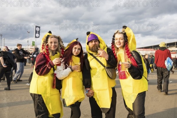 Festival visitors from Ukraine are at Rock am Ring for the 4th time and pose in banana costumes at the Rock am Ring Festival on Sunday, Nürburgring race track race track, 08.06.2025