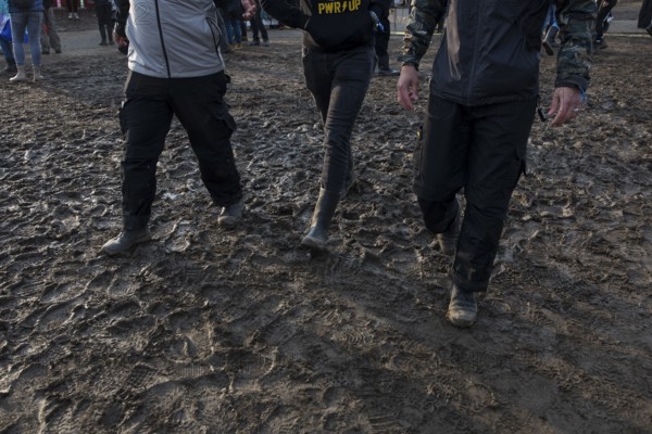 Festival visitors walk through mud in wellies at the Rock am Ring festival on Sunday, Nürburgring race track race track, 08/06/2025