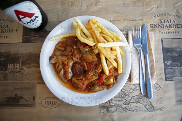 Spetsofai or Pelion sausage with onion and pepper sauce, typical dish from Pelion, Pelion peninsula or Pelion, Thessaly, Greece