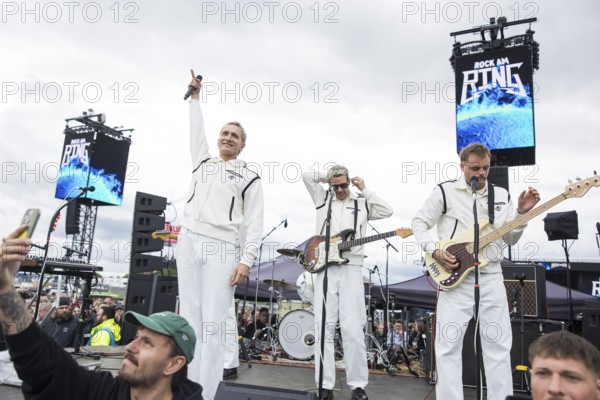 Felix Brummer (singer), Karl Schumann (guitarist) and Till Brummer (bassist) from Kraftklub at a secret gig of the band at the Rock am Ring Festival on Saturday, Nürburgring race track race track, 07.06.2025