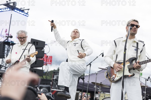 Steffen Israel (guitarist and keyboarder), Felix Brummer (singer) and Karl Schumann (guitarist) of Kraftklub at a secret gig of the band at the Rock am Ring Festival on Saturday, Nürburgring race track race track, 07/06/2025
