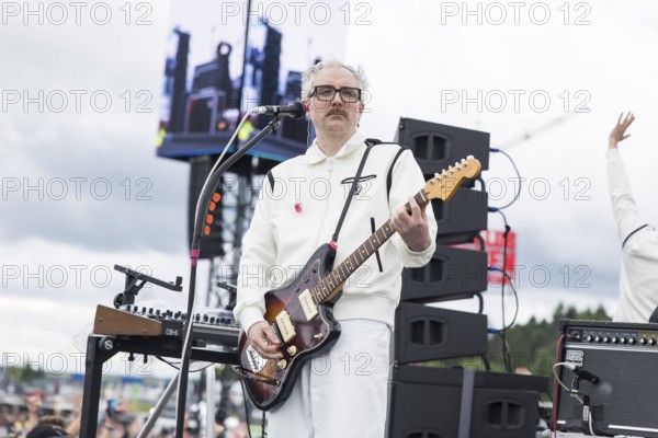 Steffen Israel, guitarist and keyboarder of Kraftklub at a secret gig of the band at the Rock am Ring Festival on Saturday, Nürburgring race track race track, 07.06.2025