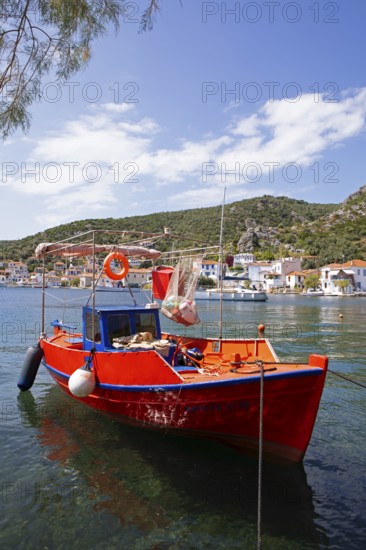 Red boat in the harbour of Agia Kiriaki on the Aegean Sea, Pelion or Pelion Peninsula, Magnisia, Thessaly, Greece