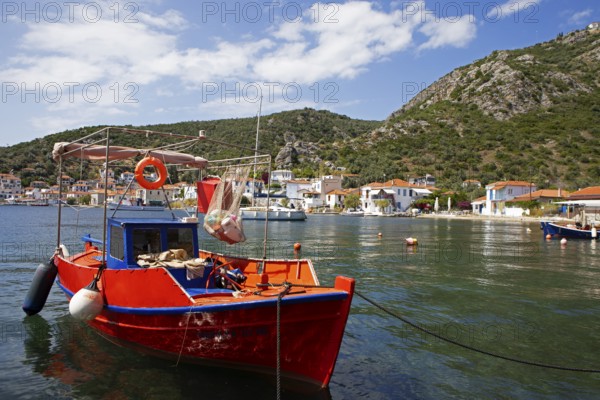 Red boat in the harbour of Agia Kiriaki on the Aegean Sea, Pelion or Pelion Peninsula, Magnisia, Thessaly, Greece