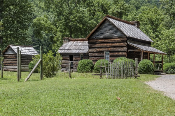 Historic log buildings at the Oconaluftee Visitor Center at Great Smoky Mountains National Park near Cherokee, North Carolina, USA