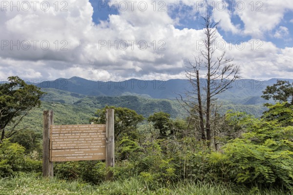 Sign along the Blue Ridge Parkway tells the origin of the Plott Bear Hounds in the Plott Balsam Range within the Smoky Mountains near Cherokee, North Carolina, USA
