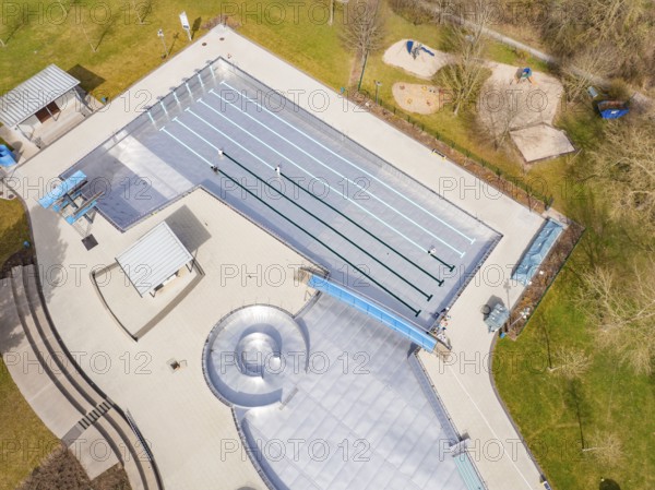 Close-up aerial view focussing on the long swimming pool and vegetation, renovation of the swimming lines, Calw Stammheim outdoor pool, Calw, Black Forest, Germany