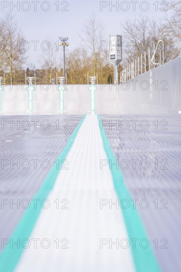 Empty swimming lane with focus on coloured lines and textured surface in the outdoor area, renewal of the swimming lines, Calw Stammheim outdoor pool, Calw, Black Forest, Germany