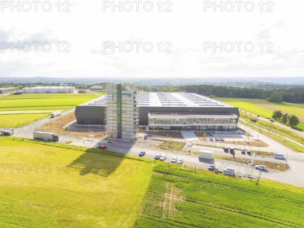 Bird's eye view of a modern industrial building surrounded by green fields, ING Park development area, Zweckverband INGpark Nagold Gäu, Nagold, Germany