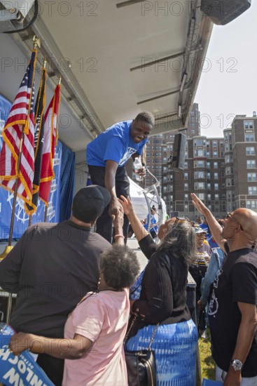 Detroit, Michigan USA - 7 June 2025 - Rev. Solomon Kinloch shakes hands after a rally in which members of the United Auto Workers supported his candidacy for mayor of Detroit. Kinloch is a former UAW member and now pastor of the nondenominational Triumph Church, which has 40, 000 members in eight locations