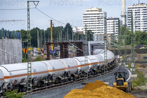 Reconstruction, extension of the Emmerich-Oberhausen railway line, three tracks, including 47 new or adapted bridges, here the new construction of railway bridges over the Lippe near Wesel, currently only 1 track in operation, goods train, the old bridges are replaced by new ones, extension of the Dutch Betuwe line from the port of Rotterdam, part of the European freight transport corridor Rotterdam-Genoa, 1300 KM long, Wesel, North Rhine-Westphalia, Germany