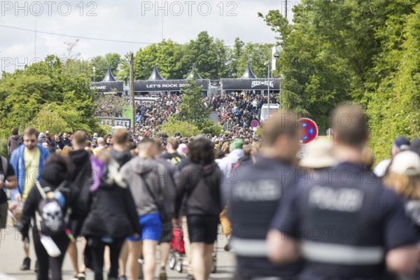 Festival visitors on their way to the main entrance at the Rock am Ring Festival on Friday, Nürburgring race track race track, 06/06/2025