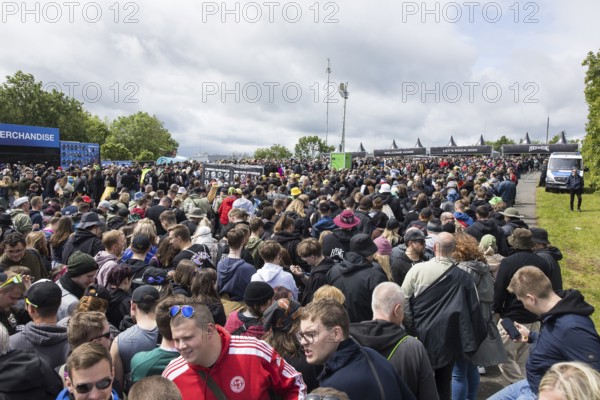 Festival visitors in front of the main entrance at the Rock am Ring Festival on Friday, Nürburgring race track race track, 06.06.2025
