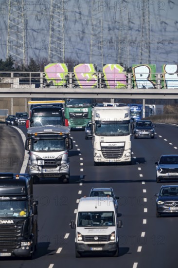 A57 motorway near Kaarst in the Rhein-Kreis Neuss, view towards Kaarst motorway junction, direction Cologne, heavy traffic, overhead line, high-voltage lines, along the motorway, North Rhine-Westphalia, Germany