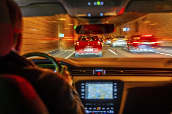 Driving on the A40 motorway, Ruhrschnellweg, in heavy traffic, driver's perspective, tunnel, Essen, North Rhine-Westphalia, Germany