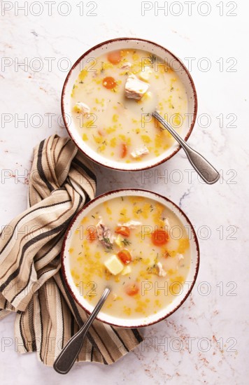 Finnish fish soup, lohikeito soup, creamy fish soup, two bowls of soup