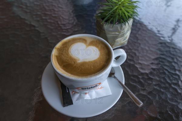 Cappuccino on a glass table, Medias, Bulgaria