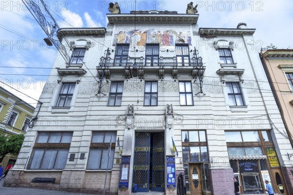 House façade with coloured frescoes, residential building around 1900, Czernowicz, Ukraine