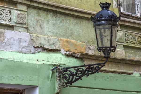 Historic lantern on a dilapidated house from the 19th century, Merias, Romania