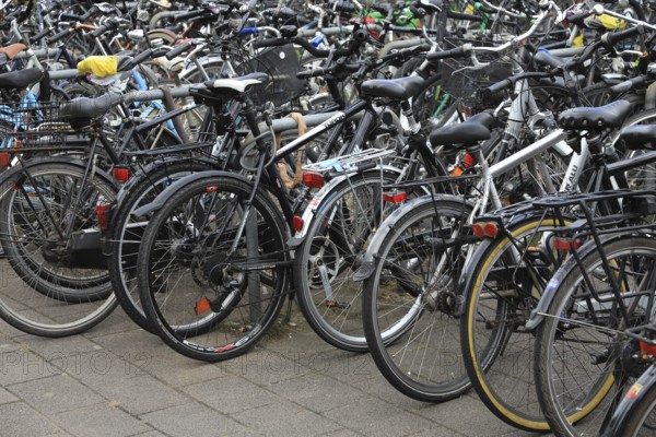 Lots of bikes in the bicycle parking lot in front of Oldenburg Central Station, Lower Saxony, Germany