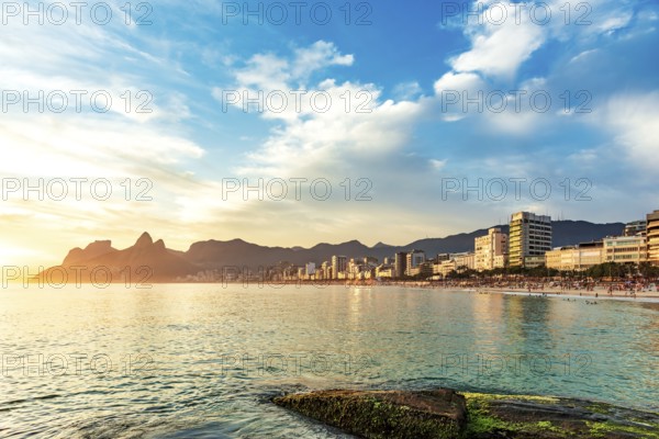 Buildings facing the sea on Ipanema beach in Rio de Janeiro during sunset, Ipanema beach, Rio de Janeiro, Rio de Janeiro, Brazil