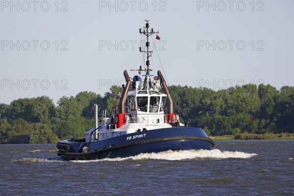 Vessel type tug VB Spirit leaves the Port of Hamburg on the Elbe, Wedel, Schleswig-Holstein, Germany